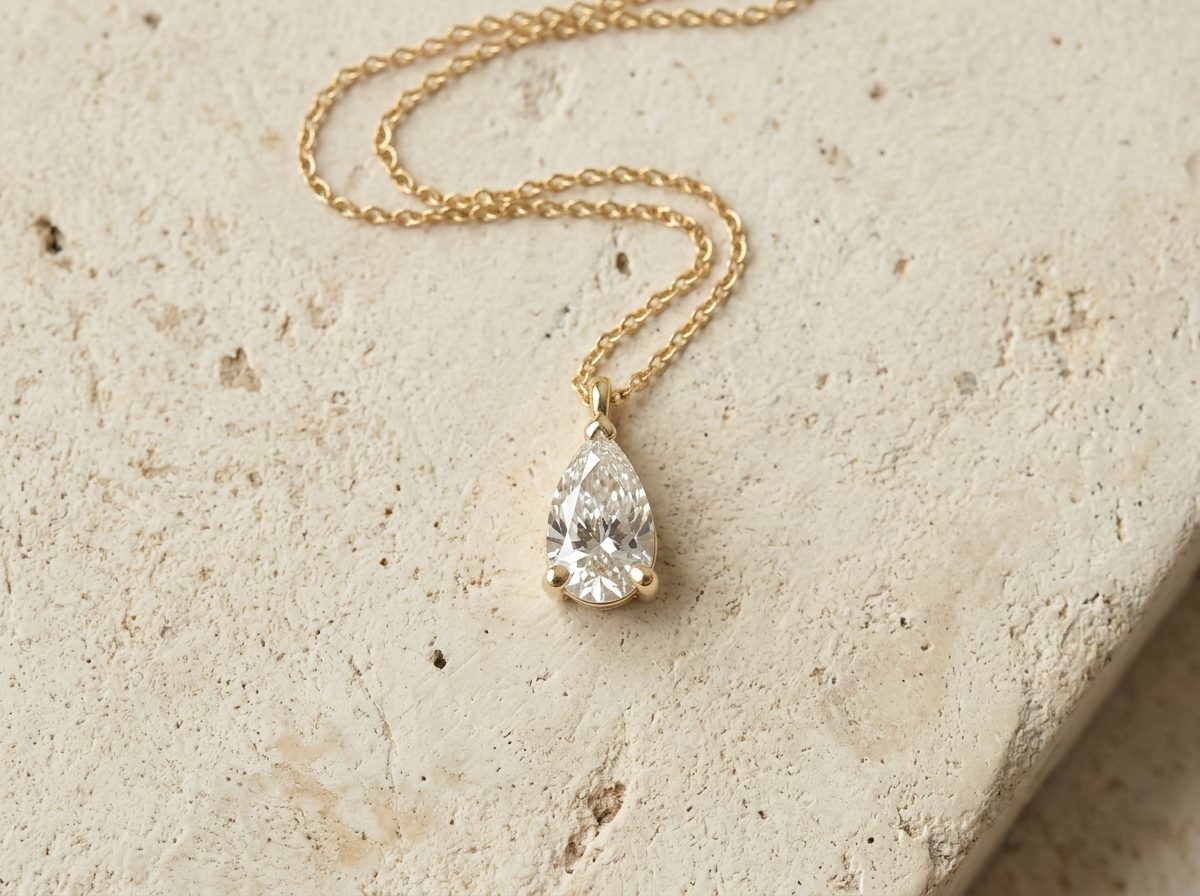 RW pear-cut diamond pendant necklace in 14k Yellow Gold, front view
